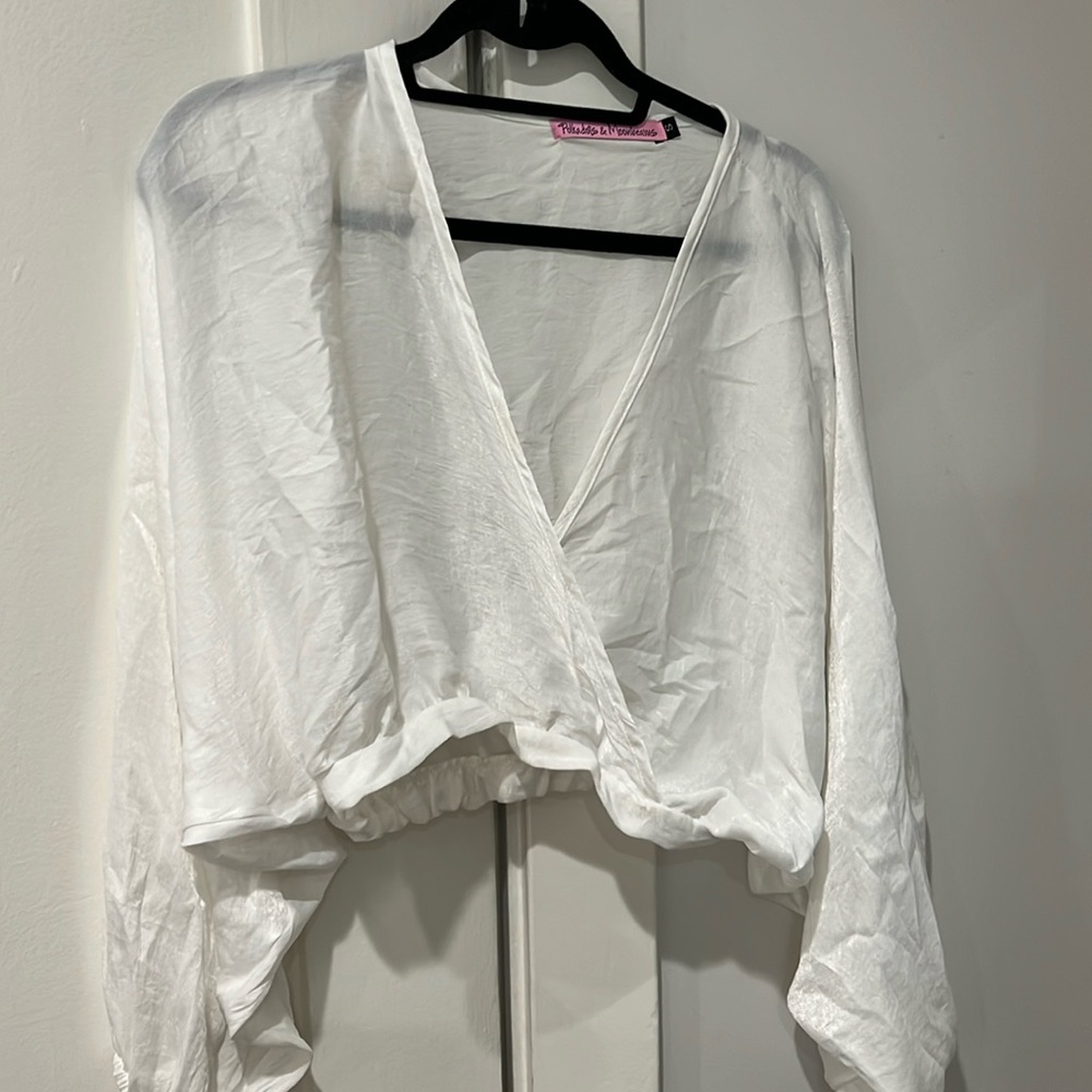 White flowy top